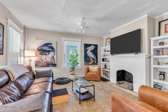 708 7th Ave, Asbury Park, NJ 07712 - living room with plenty of natural light, a baseboard heating unit, ornamental molding, a brick fireplace, and a textured ceiling