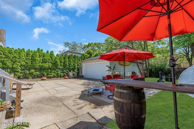 708 7th Ave, Asbury Park, NJ 07712 - view of patio / terrace with an outbuilding and a garage