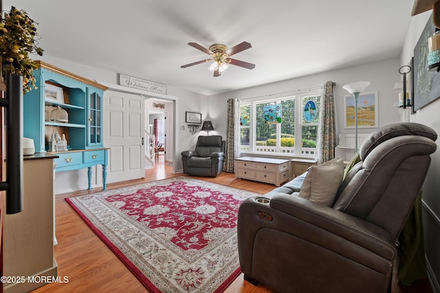 470 Nautilus Dr, Manahawkin, NJ 08050 - living room with a ceiling fan and light wood-style floors