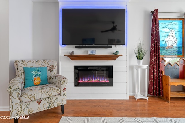 470 Nautilus Dr, Manahawkin, NJ 08050 - living area featuring wood finished floors and a glass covered fireplace