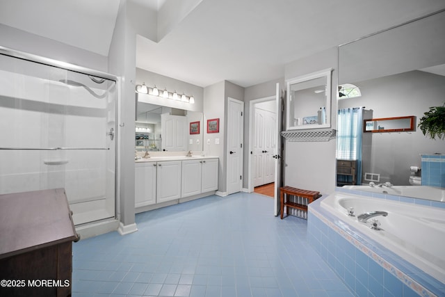 470 Nautilus Dr, Manahawkin, NJ 08050 - full bathroom with vanity, a shower stall, a bath, and tile patterned floors