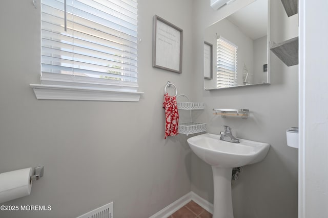 470 Nautilus Dr, Manahawkin, NJ 08050 - bathroom with plenty of natural light and tile patterned floors