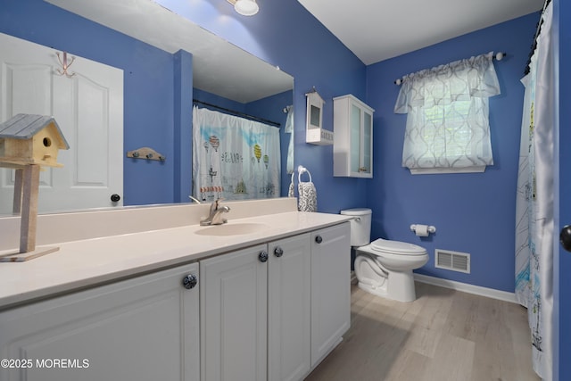 470 Nautilus Dr, Manahawkin, NJ 08050 - bathroom featuring wood finished floors, vanity, and a shower with curtain