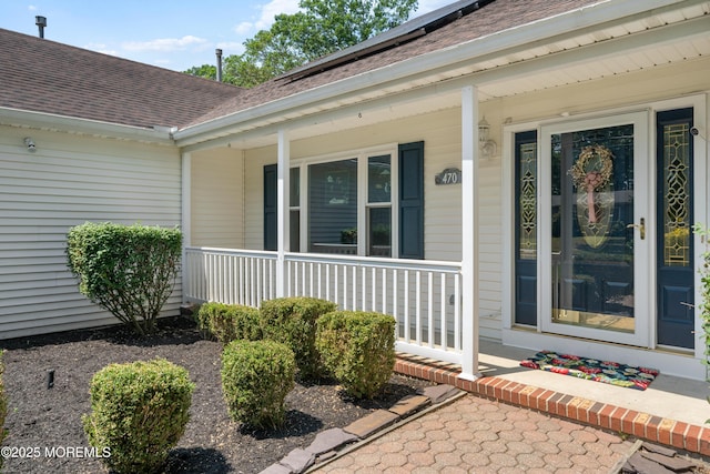 470 Nautilus Dr, Manahawkin, NJ 08050 - view of exterior entry with covered porch and a shingled roof