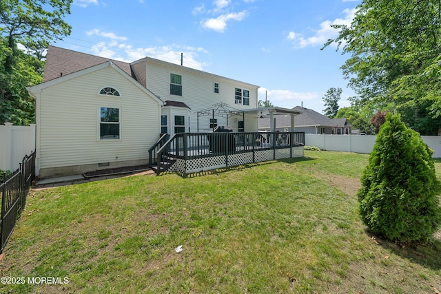 470 Nautilus Dr, Manahawkin, NJ 08050 - back of property with a fenced backyard, a wooden deck, crawl space, and a shingled roof