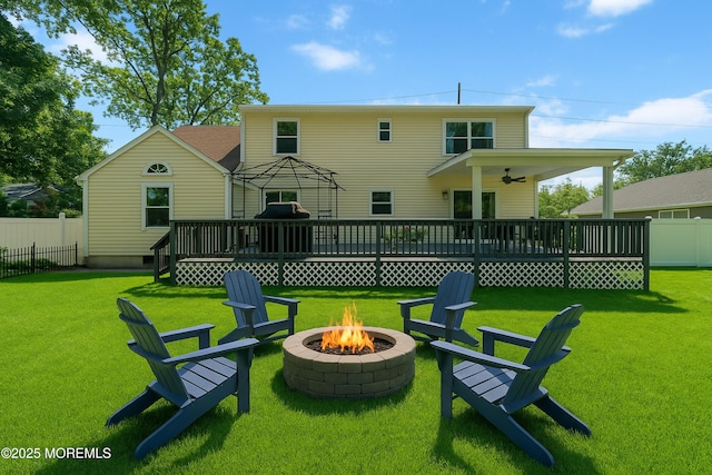 470 Nautilus Dr, Manahawkin, NJ 08050 - rear view of property with an outdoor fire pit, ceiling fan, and a wooden deck
