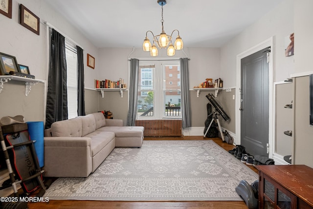 31 Riverside Ave, Red Bank, NJ 07701 - living area featuring wood finished floors and a chandelier