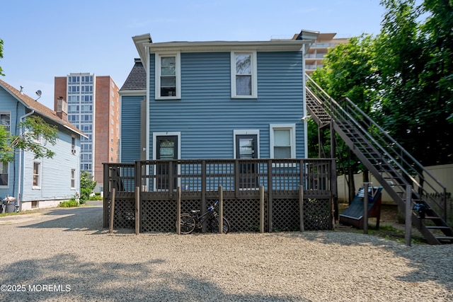 31 Riverside Ave, Red Bank, NJ 07701 - back of property with a wooden deck