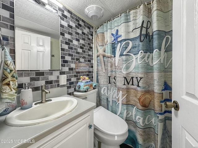 709 Union Ave Unit 5, Brielle, NJ 08730 - bathroom featuring decorative backsplash, vanity, a textured ceiling, and a shower with curtain