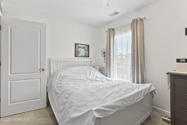 628 Morningside Ave, Union Beach, NJ 07735 - bedroom with light carpet