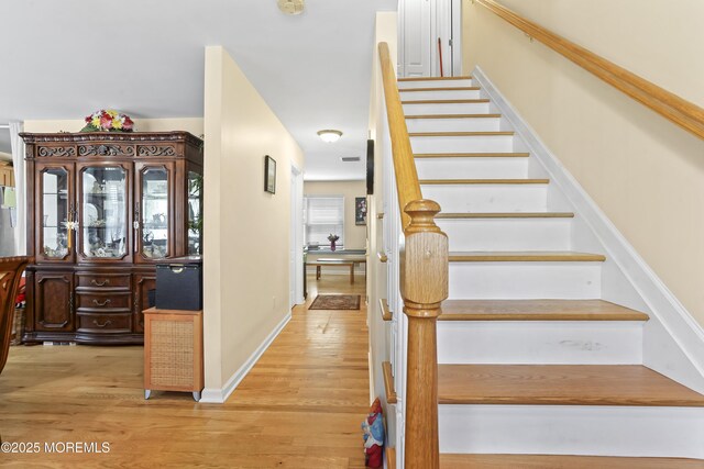 628 Morningside Ave, Union Beach, NJ 07735 - staircase with wood finished floors and baseboards