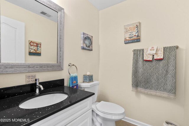628 Morningside Ave, Union Beach, NJ 07735 - half bath featuring toilet, vanity, and tile patterned flooring