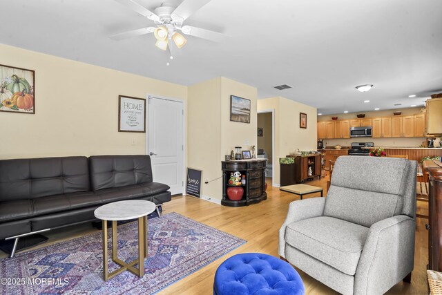 628 Morningside Ave, Union Beach, NJ 07735 - living room featuring ceiling fan, light wood-style floors, baseboards, and recessed lighting