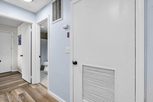 305 Daisy Ct, Jackson, NJ 08527 - corridor with wood finished floors