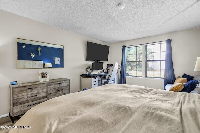 305 Daisy Ct, Jackson, NJ 08527 - bedroom featuring a textured ceiling and wood finished floors