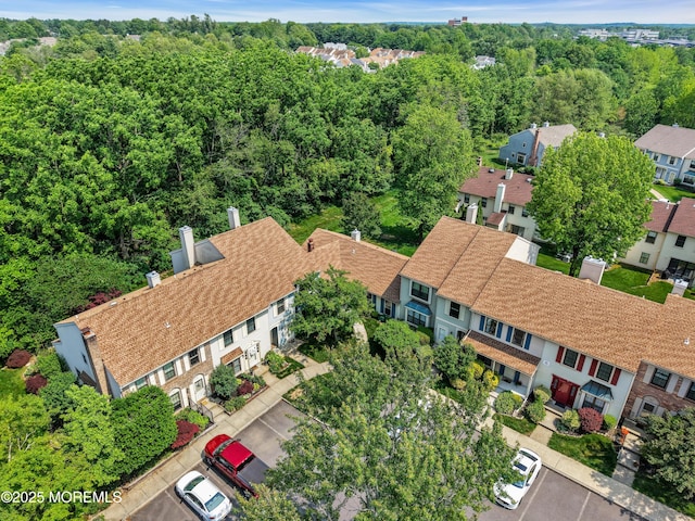 6 Claridge Ct # 5, Freehold, NJ 07728 - aerial view of residential area with a heavily wooded area