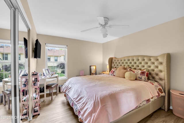 6 Claridge Ct # 5, Freehold, NJ 07728 - bedroom featuring a ceiling fan and wood finished floors