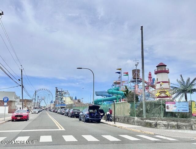 64 Sheridan Ave Unit A, Seaside Heights, NJ 08751 - view of asphalt street featuring sidewalks, curbs, and street lights