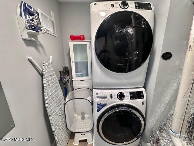 64 Sheridan Ave Unit A, Seaside Heights, NJ 08751 - washroom with stacked washing machine and dryer