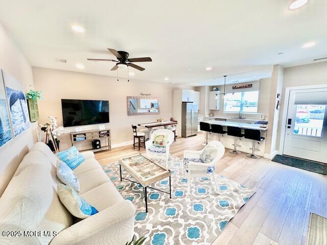 64 Sheridan Ave Unit A, Seaside Heights, NJ 08751 - living room with light wood finished floors, recessed lighting, a ceiling fan, and baseboards