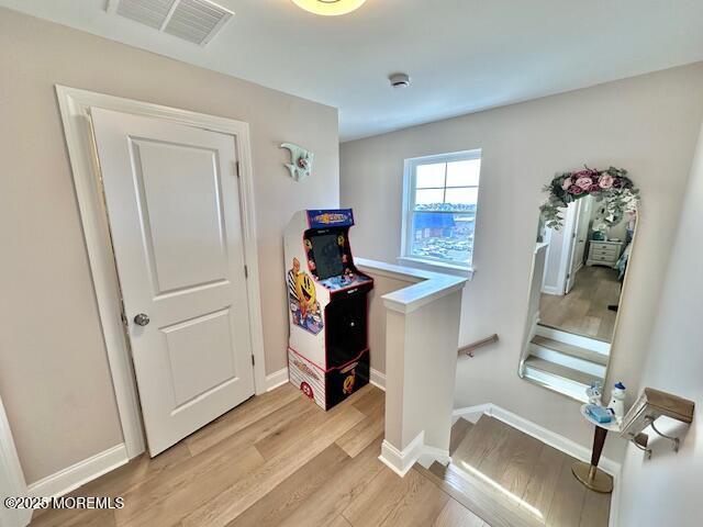 64 Sheridan Ave Unit A, Seaside Heights, NJ 08751 - staircase with wood finished floors and baseboards