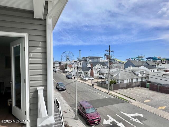 64 Sheridan Ave Unit A, Seaside Heights, NJ 08751 - view of asphalt street featuring sidewalks, a residential view, and curbs