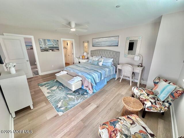 64 Sheridan Ave Unit A, Seaside Heights, NJ 08751 - bedroom with wood finished floors, baseboards, ceiling fan, and ensuite bath