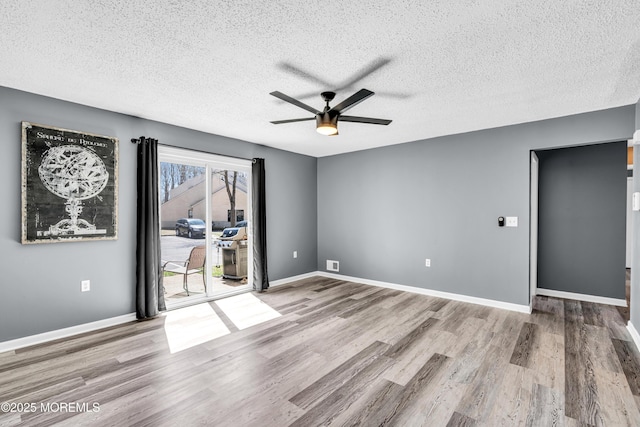 113 Whispering Oaks Way, Jackson, NJ 08527 - unfurnished room with ceiling fan, wood finished floors, a textured ceiling, and baseboards