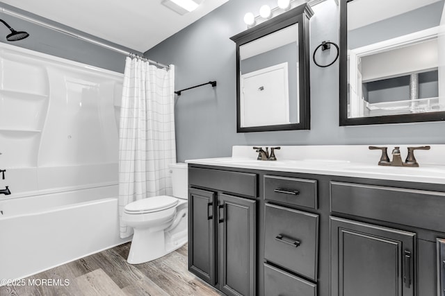 113 Whispering Oaks Way, Jackson, NJ 08527 - full bath with wood finished floors, double vanity, shower / bathtub combination with curtain, and toilet