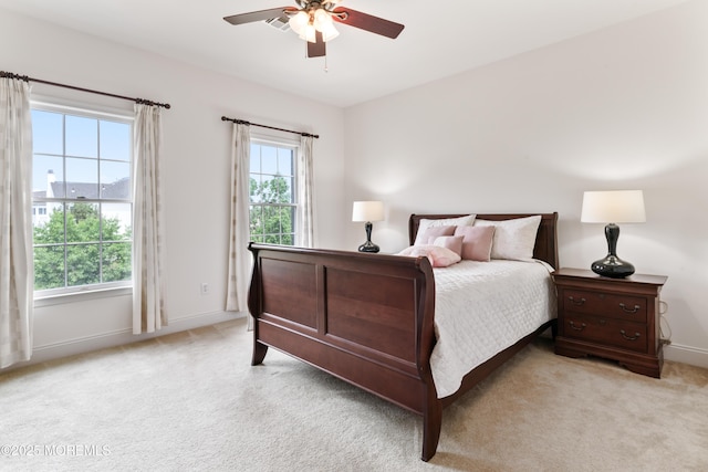 27 Witherspoon Way, Marlboro, NJ 07746 - bedroom with light carpet, baseboards, and a ceiling fan