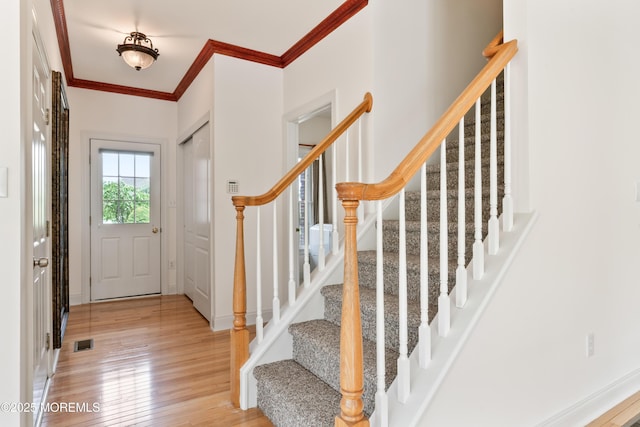27 Witherspoon Way, Marlboro, NJ 07746 - foyer entrance featuring wood finished floors, ornamental molding, and stairs