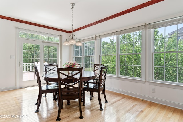 27 Witherspoon Way, Marlboro, NJ 07746 - dining area with plenty of natural light, baseboards, light wood finished floors, and ornamental molding