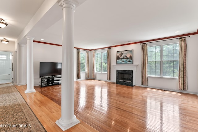 27 Witherspoon Way, Marlboro, NJ 07746 - unfurnished living room featuring decorative columns, crown molding, a premium fireplace, light wood-style flooring, and baseboards