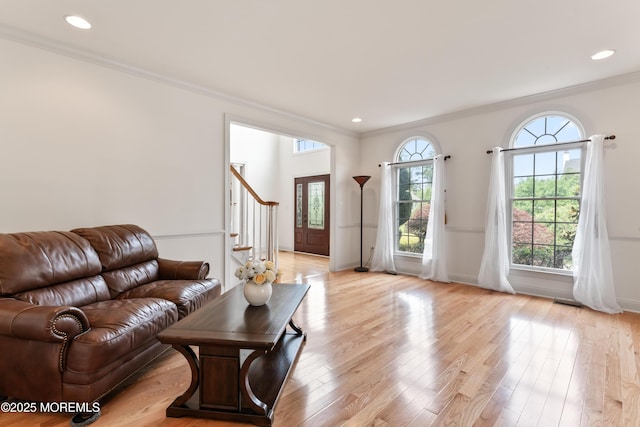 27 Witherspoon Way, Marlboro, NJ 07746 - living area featuring crown molding, stairs, light wood-type flooring, recessed lighting, and baseboards