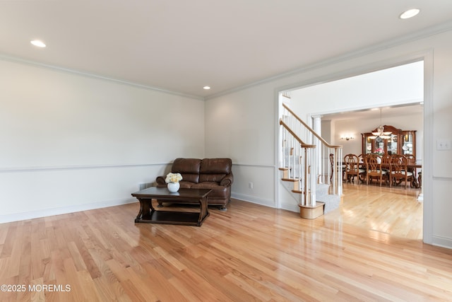 27 Witherspoon Way, Marlboro, NJ 07746 - sitting room with crown molding, wood finished floors, stairway, recessed lighting, and baseboards