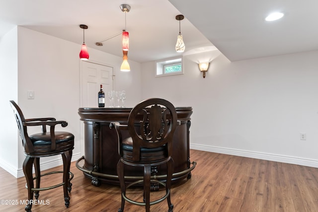 27 Witherspoon Way, Marlboro, NJ 07746 - indoor dry bar with wood finished floors, baseboards, and pendant lighting