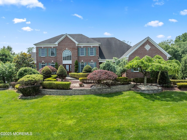 27 Witherspoon Way, Marlboro, NJ 07746 - georgian-style home with brick siding and a front yard