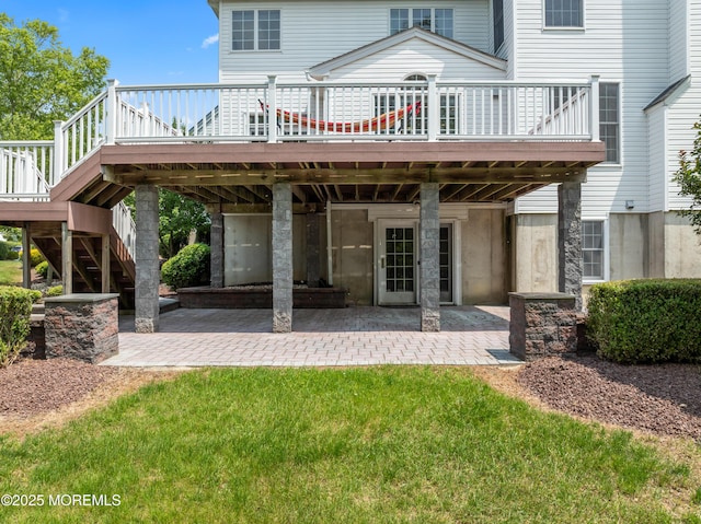 27 Witherspoon Way, Marlboro, NJ 07746 - back of property with a deck, a patio area, stairs, and a lawn