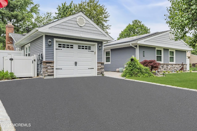 103 Idlewild Ln, Aberdeen, NJ 07747 - ranch-style house with stone siding and asphalt driveway