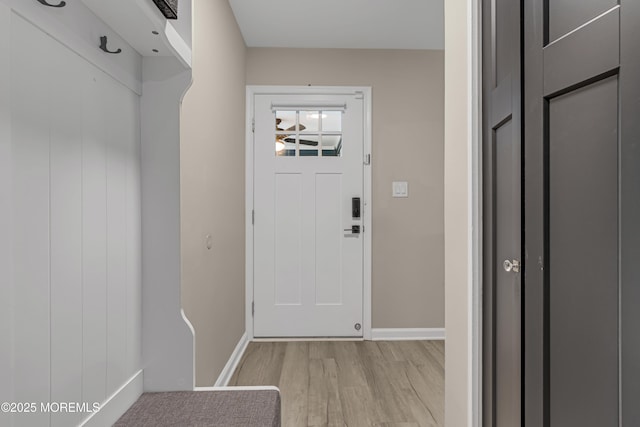 103 Idlewild Ln, Aberdeen, NJ 07747 - mudroom with light wood-style floors and baseboards