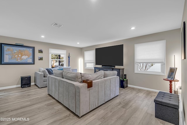 103 Idlewild Ln, Aberdeen, NJ 07747 - living room with light wood-type flooring, baseboards, and recessed lighting