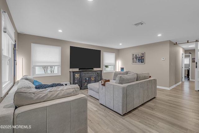 103 Idlewild Ln, Aberdeen, NJ 07747 - living area featuring light wood-type flooring, plenty of natural light, recessed lighting, and baseboards