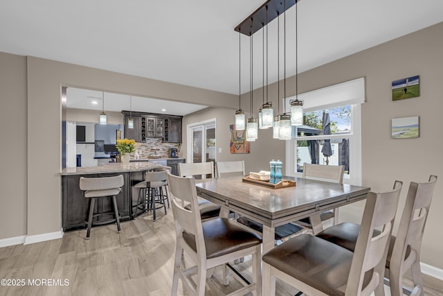 103 Idlewild Ln, Aberdeen, NJ 07747 - dining space featuring baseboards and light wood-type flooring