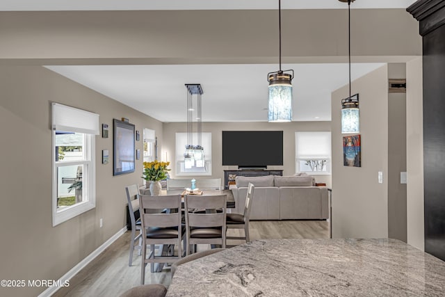 103 Idlewild Ln, Aberdeen, NJ 07747 - dining space featuring light wood-type flooring and baseboards