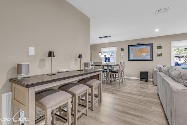 103 Idlewild Ln, Aberdeen, NJ 07747 - dining room with light wood-style flooring, baseboards, and recessed lighting