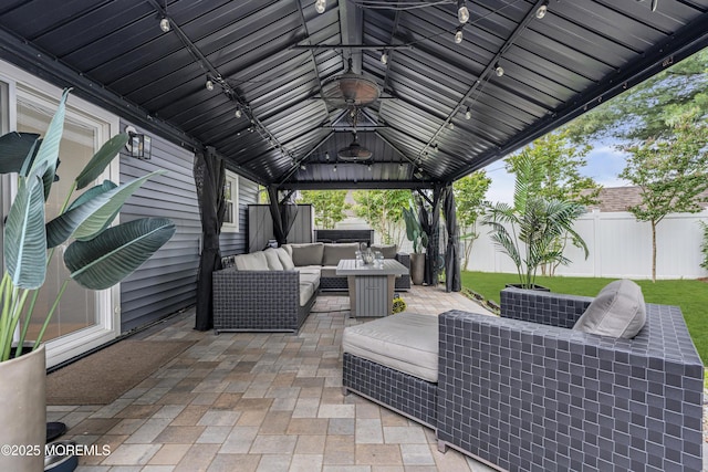 103 Idlewild Ln, Aberdeen, NJ 07747 - fenced backyard featuring outdoor lounge area, a gazebo, and a patio