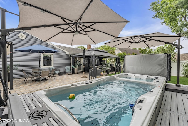 103 Idlewild Ln, Aberdeen, NJ 07747 - view of pool with a gazebo, a hot tub, a patio area, and outdoor dining space