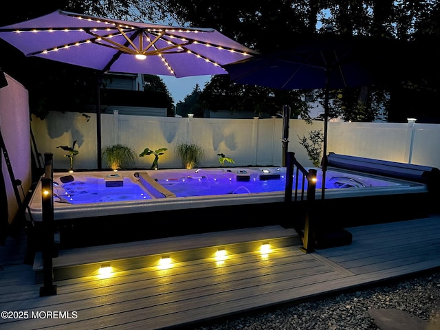 103 Idlewild Ln, Aberdeen, NJ 07747 - deck at twilight with a hot tub