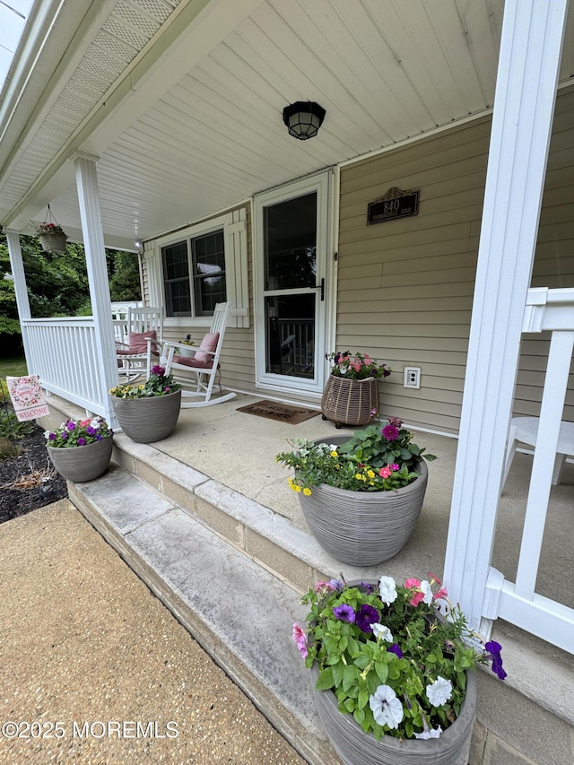 840 Farmingdale Rd, Jackson, NJ 08527 - property entrance featuring a porch