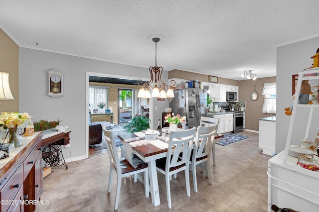 17 Evergreen Pl, Howell, NJ 07731 - dining area with a chandelier, healthy amount of natural light, a textured ceiling, and crown molding